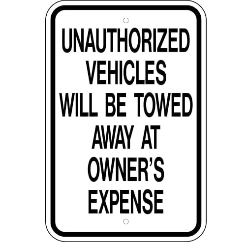 Unauthorized Vehicles Will Be Towed Sign